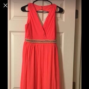 Vestido elegante largo y corto por dentro.